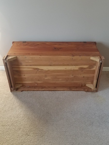 The underside of a cedar chest.