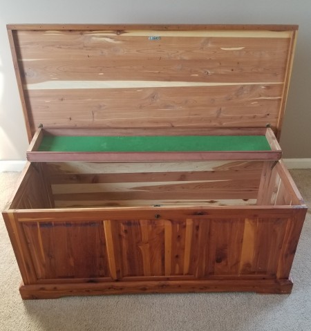 An open cedar chest