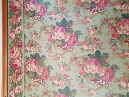 A floral wallpaper.