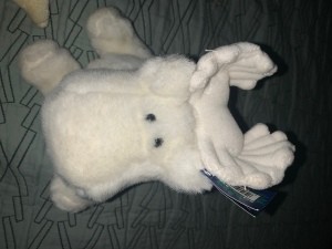 A white stuffed animal.