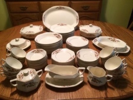 A set of china on a table.