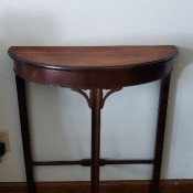 A wooden side table.