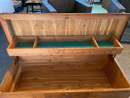 The inside of a cedar lined chest.