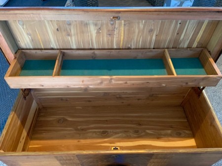 The inside of a cedar lined chest.