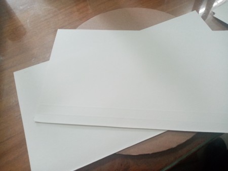 White paper to wrap around the base.