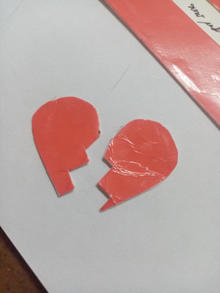 A broken heart made from the red cardstock.