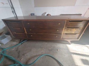 A long dresser with 9 drawers.