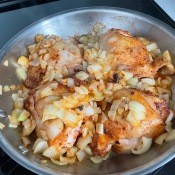 The cooked chicken and onions.