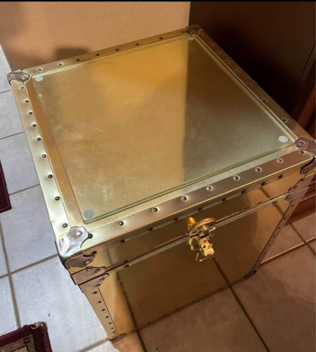 The brass clad trunk.