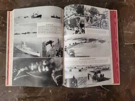 A book open to printed pictures.