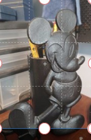 A Mickey Mouse figurine.