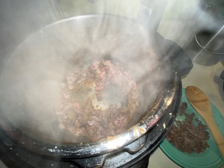 Cooking beef in the pot.