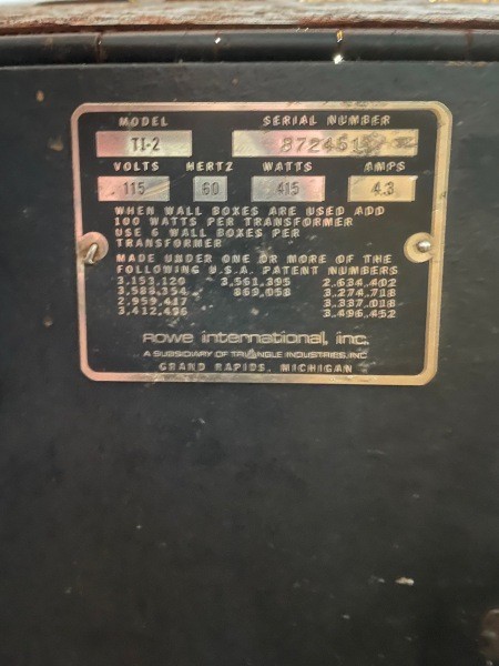 The serial number on the back of a jukebox.