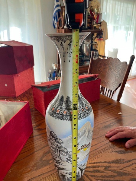 Measuring a tall vase.