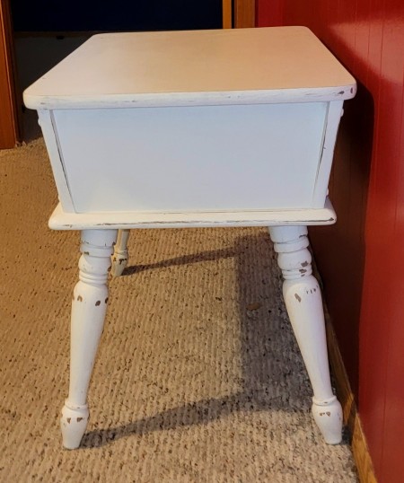 The side of the side table.