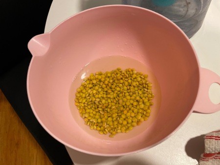 The lentils soaking in water.