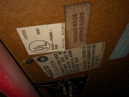 Markings on the back of the record player.