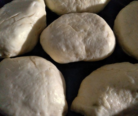 Making small hand pies from the dough and apples.