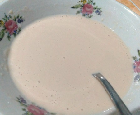 Mixing the yeast with water.