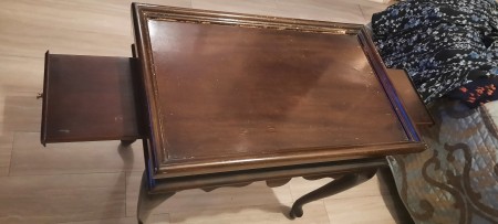 A small wooden tea table.