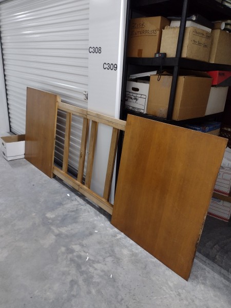 A wooden table that is deconstructed.