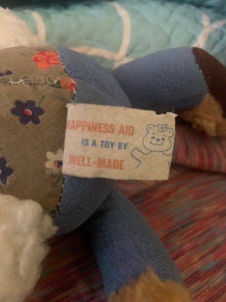 The tag on a plush lamb.