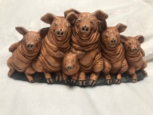 A pig family figurine.