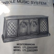 An owner's manual for a Sears stereo console.