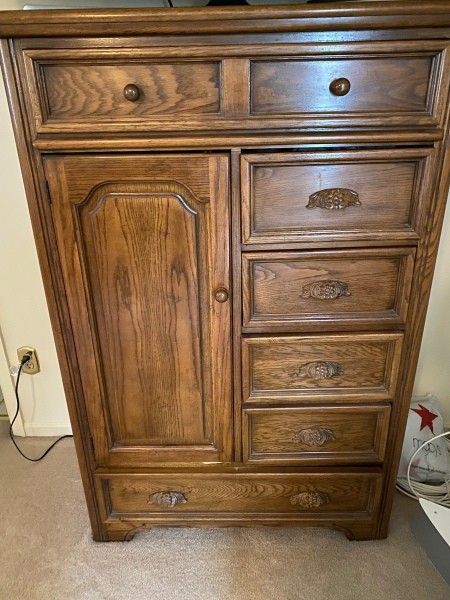 A tall wooden cabinet.
