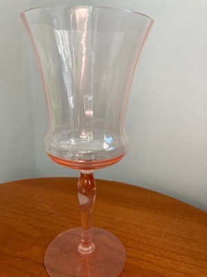 A pink goblet style glass.