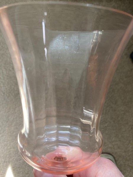 A glass with a pink tint.