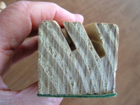 The grooves in a card holder.