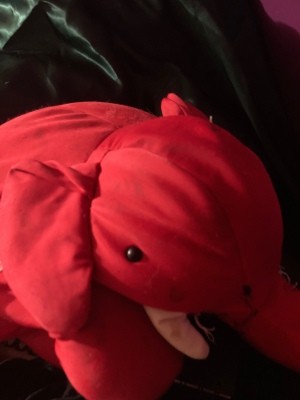 A stuffed red elephant.