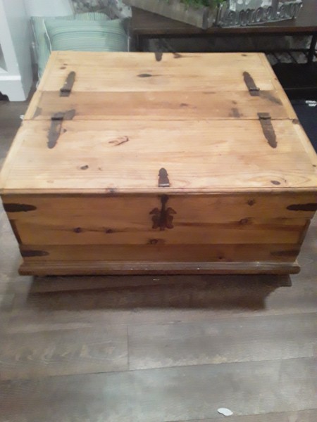 A wooden coffee table.