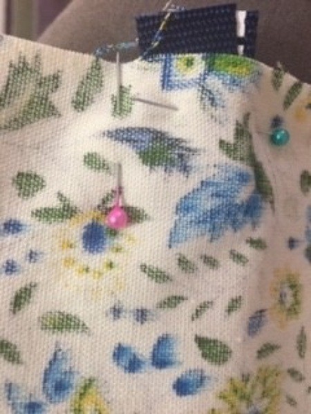 Pinning the fabric.