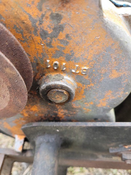 An old piece of farm equipment.