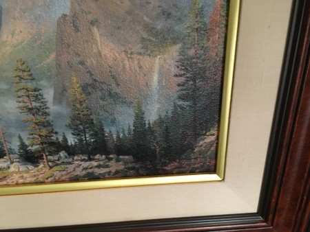 A Thomas Kinkade painting of Yosemite Valley.