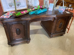 An old fashioned wooden desk.