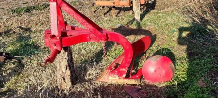 A red plow