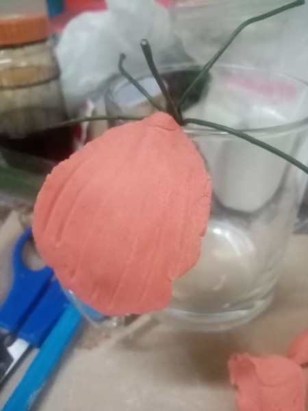 Adding petals to the flower.