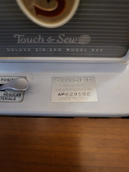 The serial number on a sewing machine.