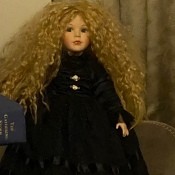 A doll with long blonde hair.