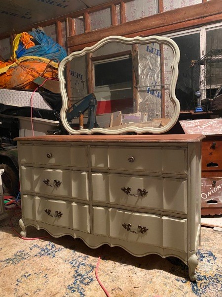 A vingage Bassett dresser with a mirror.