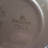 The marking on the back of the china.
