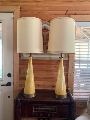 Two tall glass lamps.