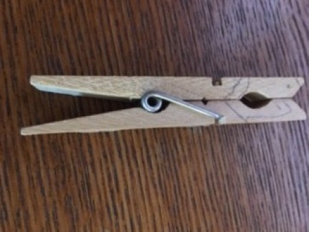 A wooden clothespin.