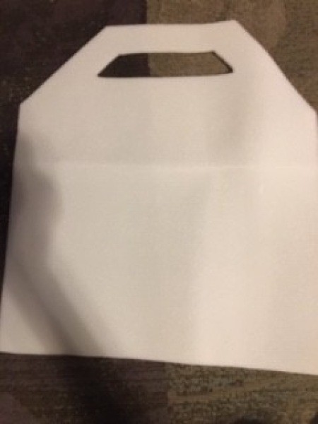 A cut out piece of white fabric.