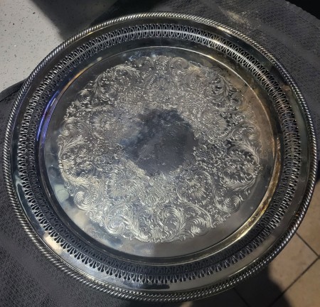 A round silver serving tray.