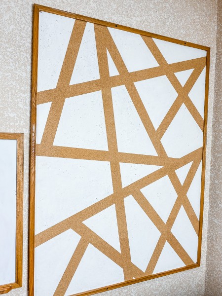 The painted board after the tape has been removed.