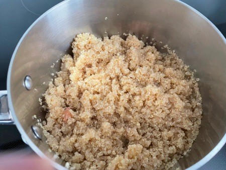 The cooked quinoa.